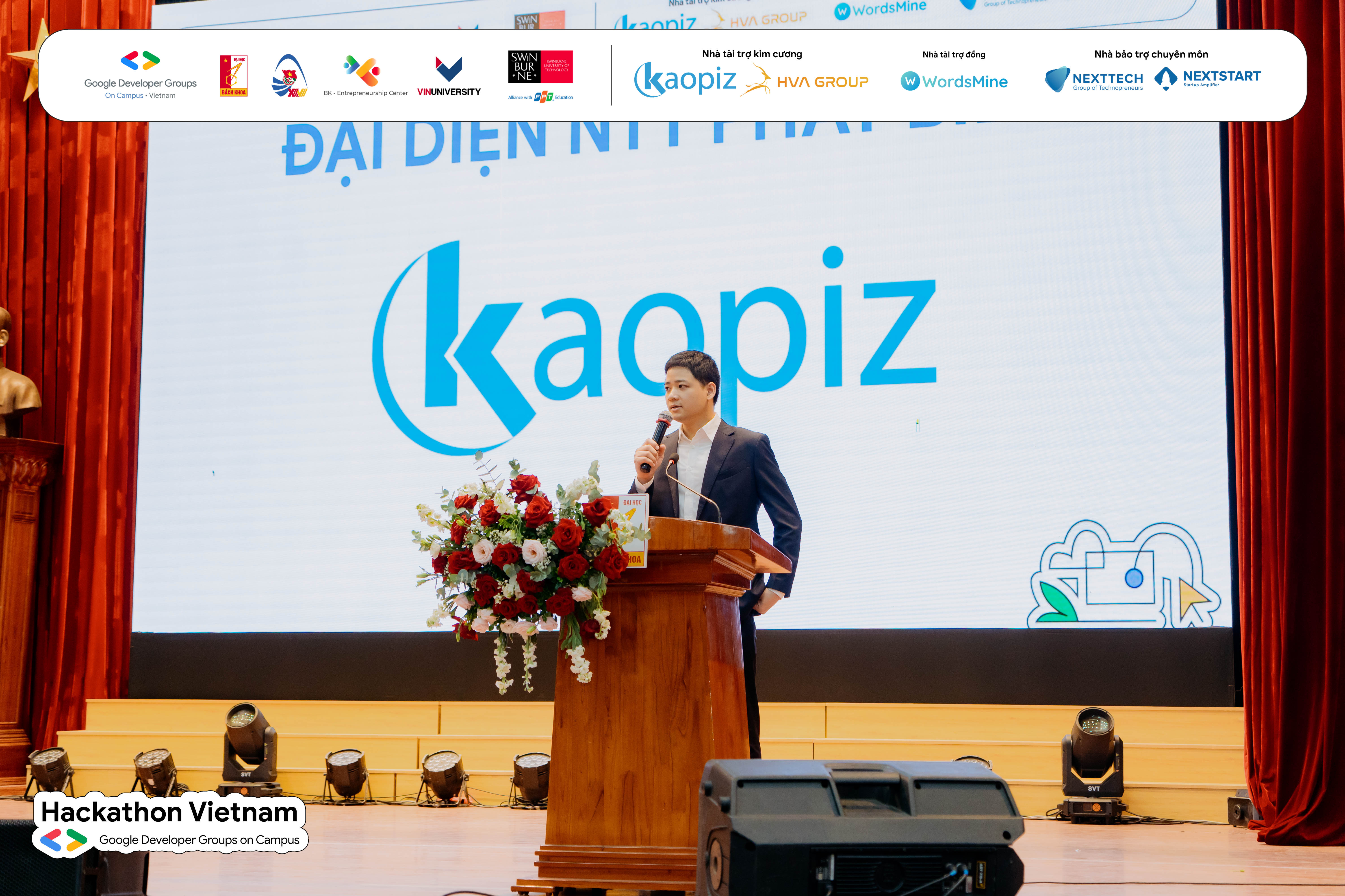 Le Hai Bang from Kaopiz judging final round projects at GDGoC Hackathon Vietnam 2025