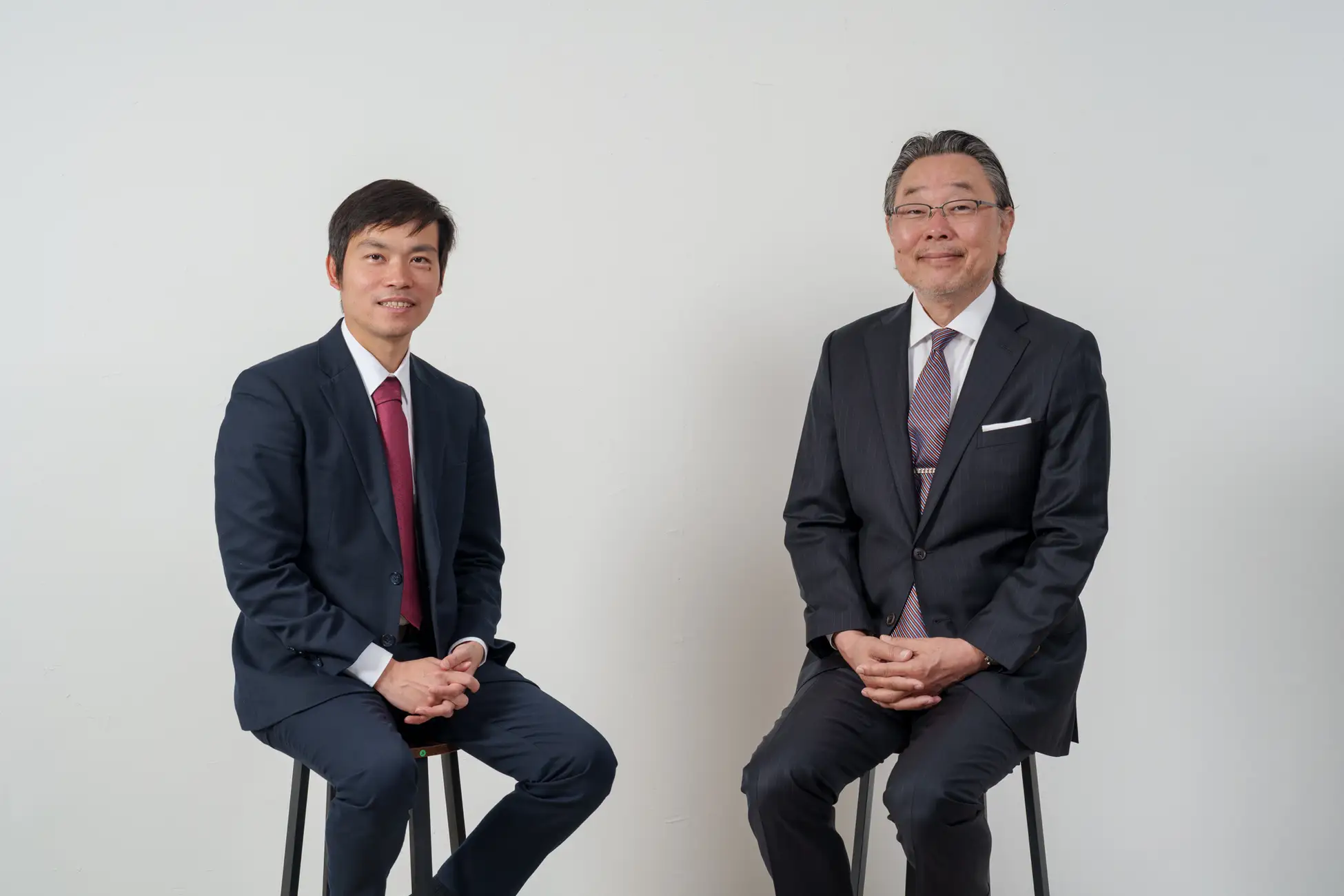 株式会社カオピーズ-代表取締役-チン・コン・フアン（左）と、最高経営戦略顧問に就任した杉原博茂氏（右）。